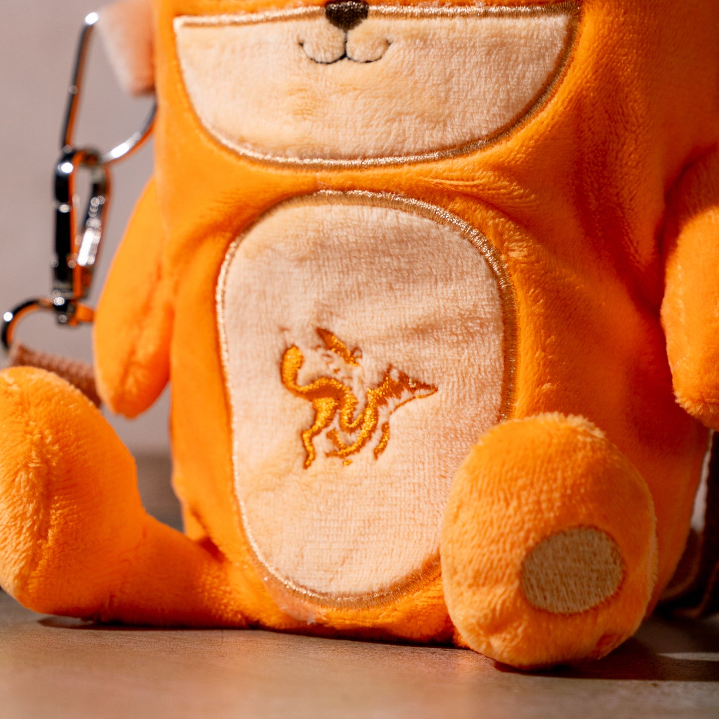 raposa fox plush cup sleeve detail with embroidered logo