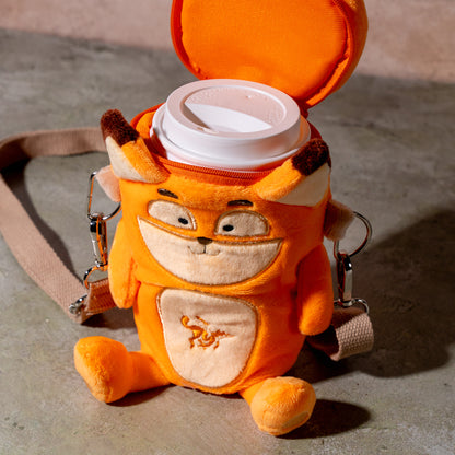 fox plush coffee cup holder with hot coffee cup inside, top view