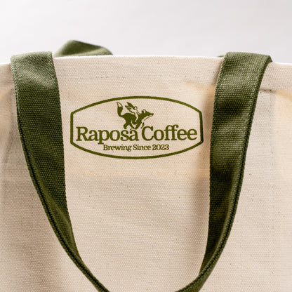 back view of raposa new york canvas tote bag with raposa coffee co logo