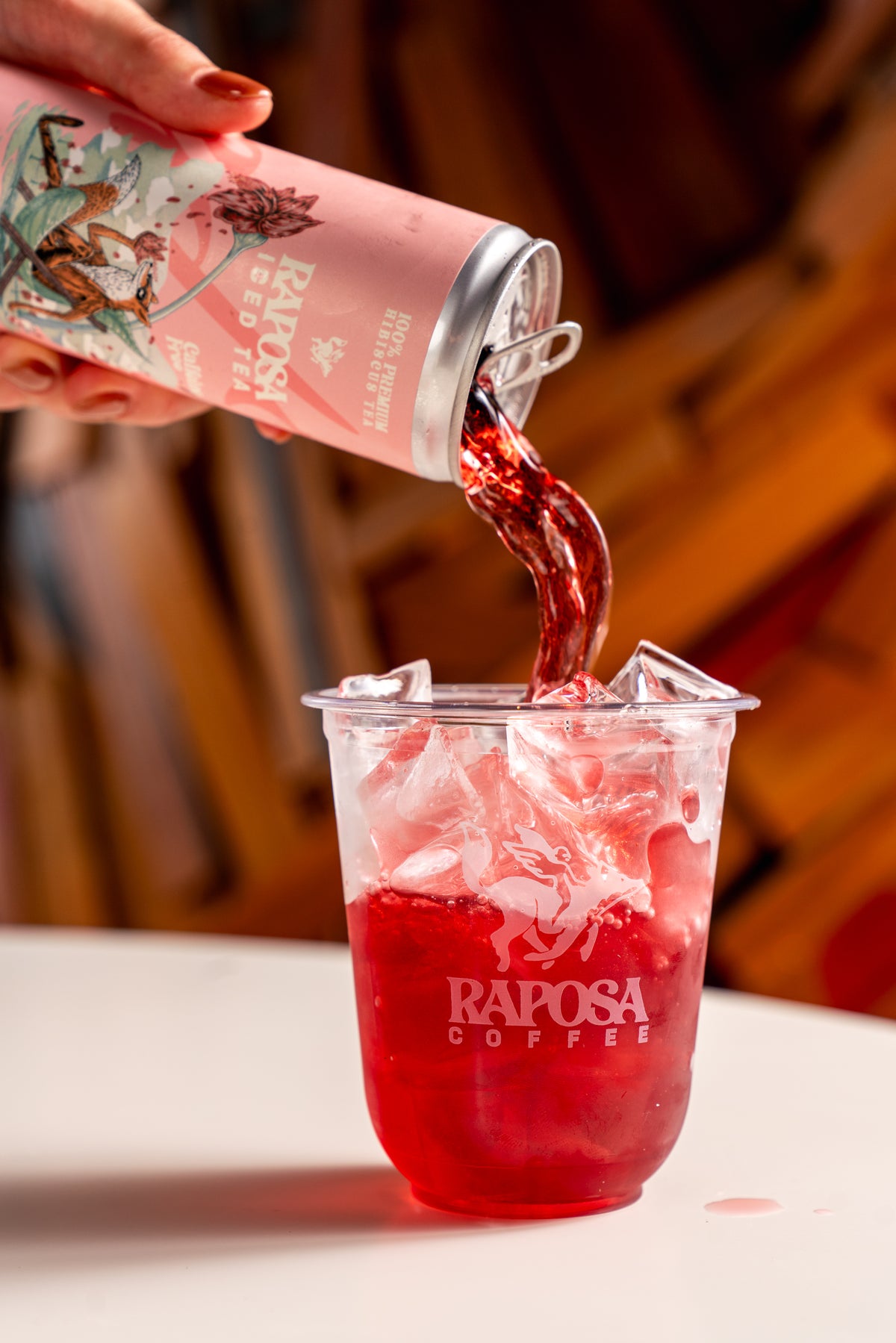 raposa hibiscus iced tea poured over ice