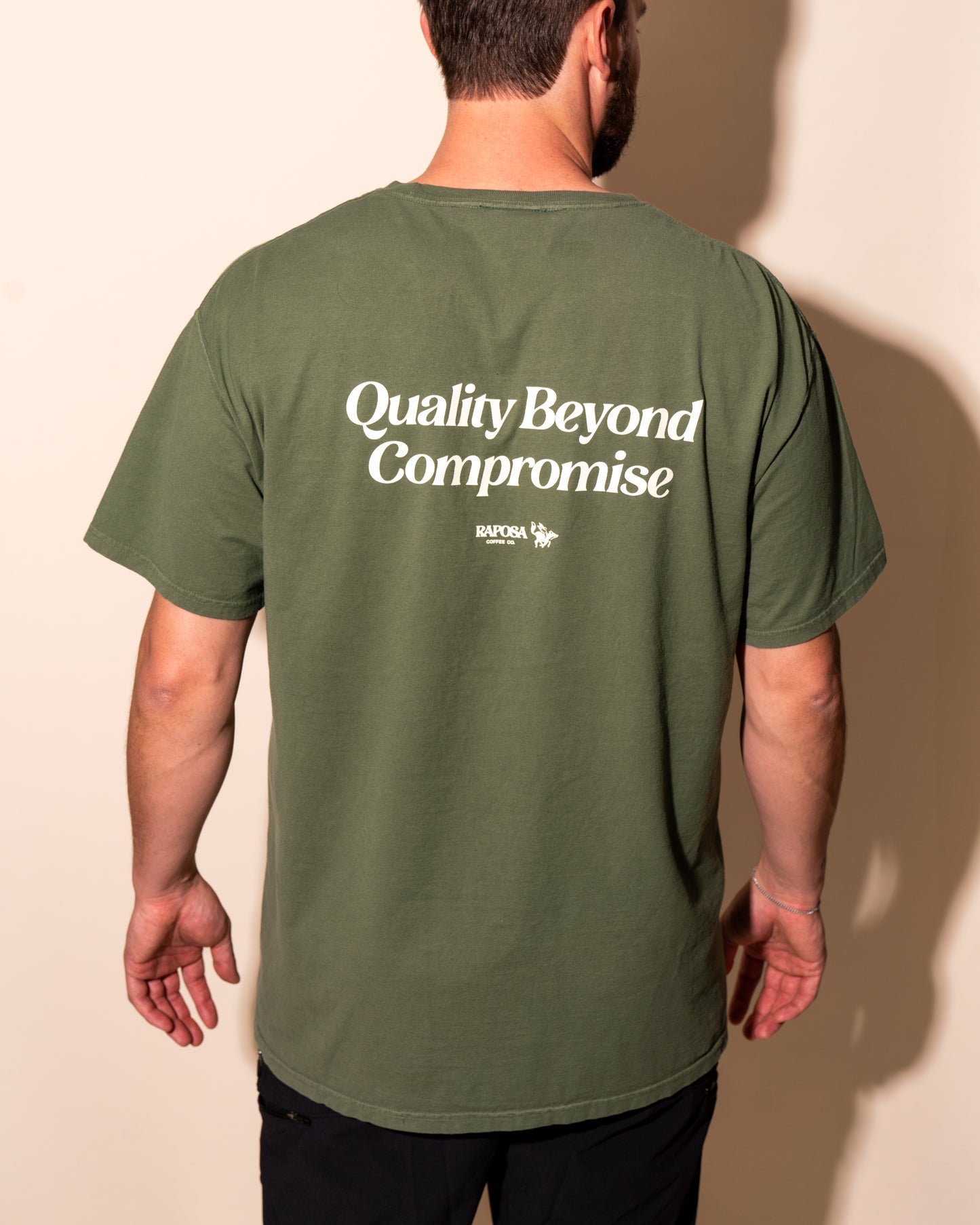 Raposa olive green t-shirt back print Quality Beyond Compromise graphic