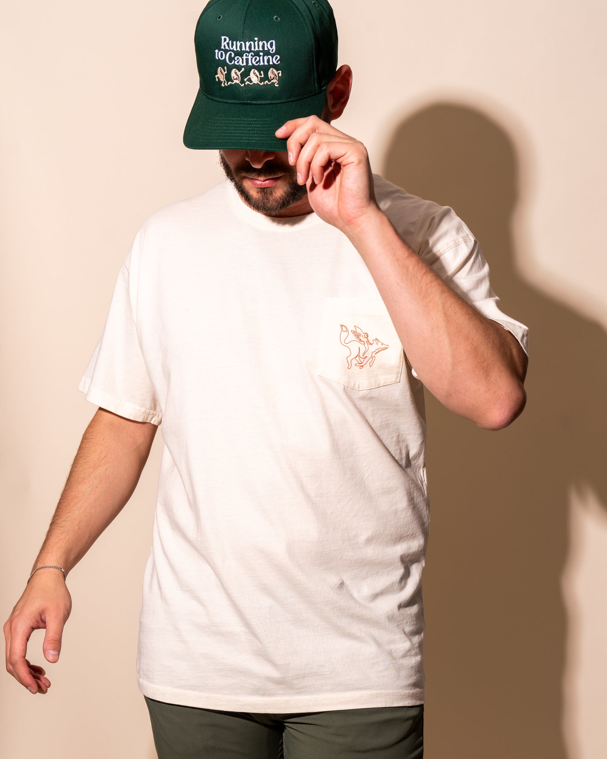 Raposa roastery pocket tee cream worn by model lifestyle photo