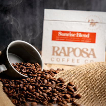 Sunrise Blend specialty coffee beans and Raposa Coffee packaging