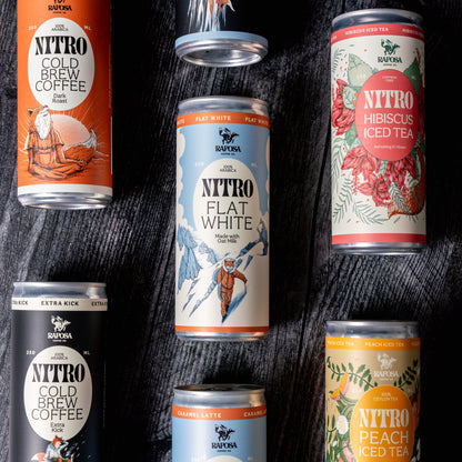 Close-up of Raposa nitro cold brew and iced tea cans showing flavor labels